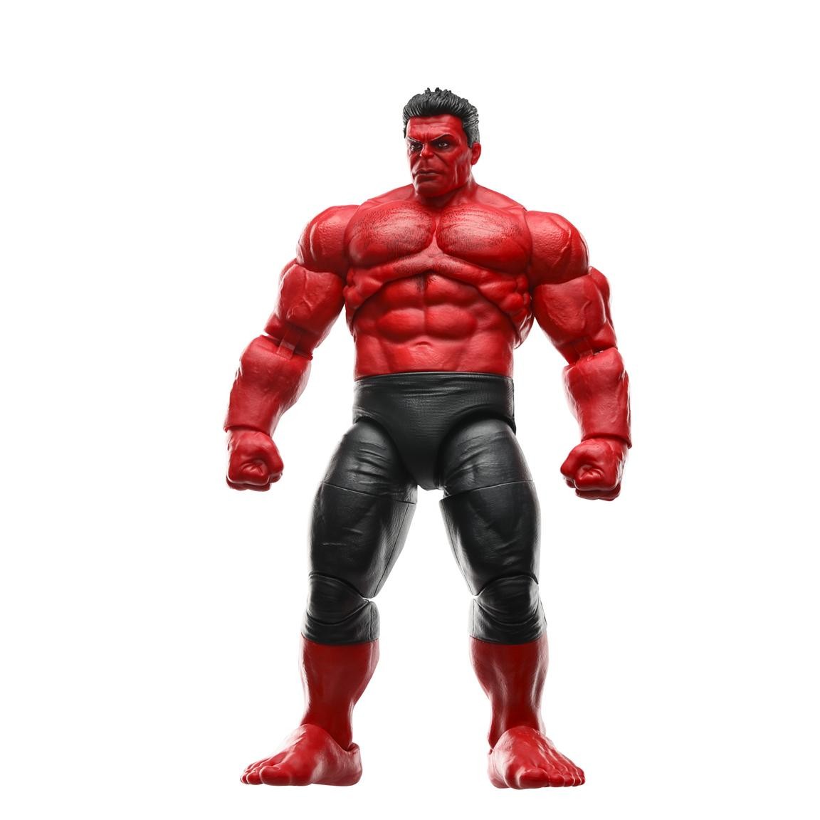 Red Hulk action figure with muscular physique, bright red skin, black pants, and detailed facial features, standing in a powerful pose.