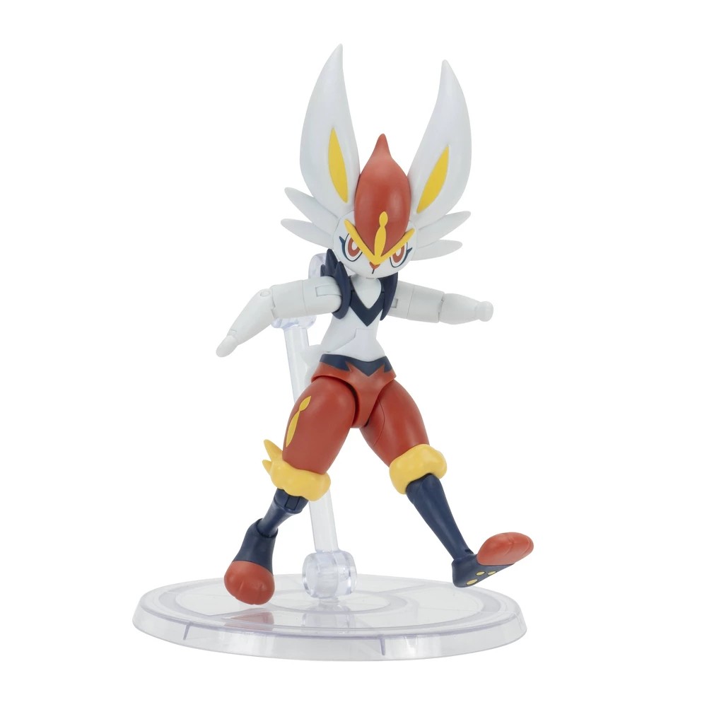 Cinderace figure stands on a clear base, featuring red and white fur, large ears, a black and white torso, and dynamic pose with one arm outstretched.