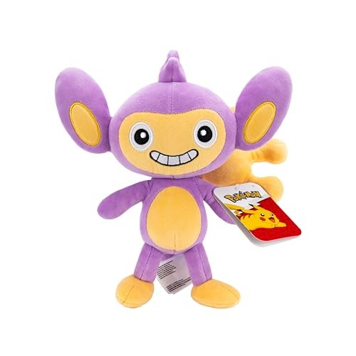 Purple Aipom soft toy with a cheerful face, large ears, and a yellow belly, made of plush material, featuring a Pokémon tag attached.