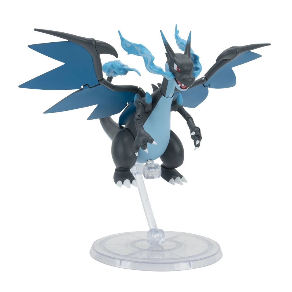 Mega Charizard X action figure features a sleek black and blue design with prominent wings, dynamic pose, and translucent blue flames, mounted on a clear display stand.