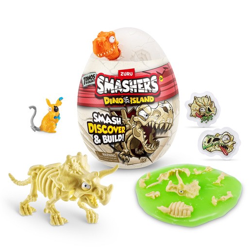 A white egg with a dinosaur design, featuring a small orange dinosaur on top, surrounded by a yellow dinosaur figure, green slime, and collectible stickers.