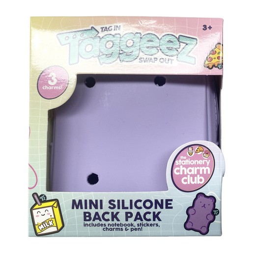 Purple silicone mini backpack craft set featuring three charms, includes a notebook, stickers, charms, and a pen, packaged in a colorful box with playful graphics.