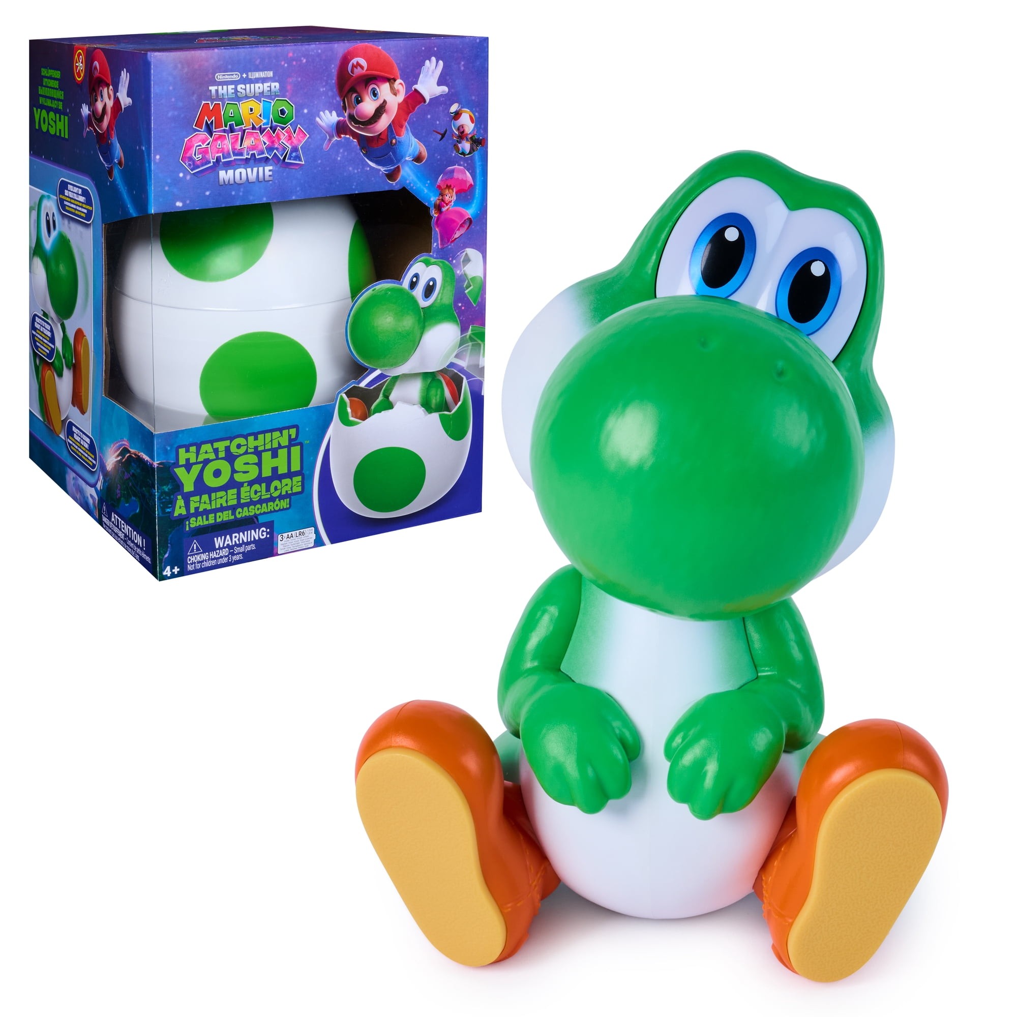 Interactive Yoshi action figure in bright green and white, with large eyes and orange shoes, sitting next to its colorful packaging featuring the Super Mario Galaxy Movie branding.