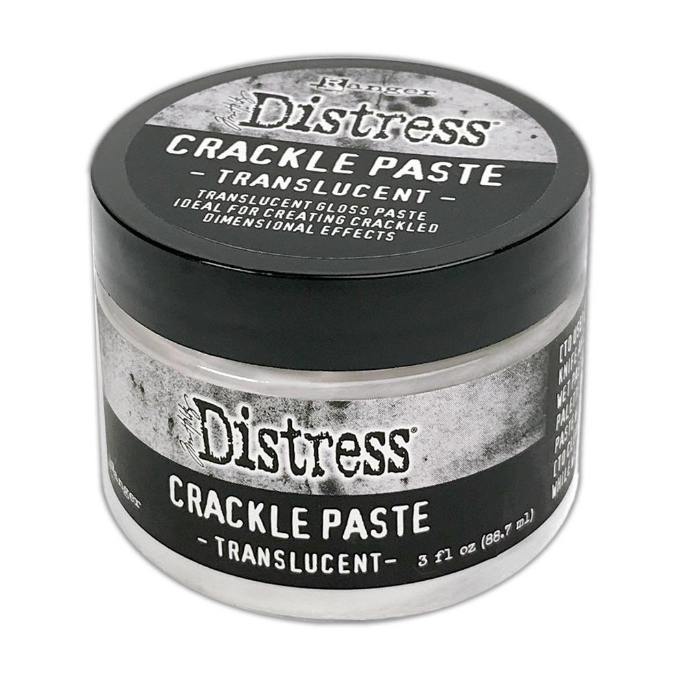 Translucent crackle paste in a clear jar with a black lid, labeled "Distress Crackle Paste" by Tim Holtz, ideal for creating textured, cracked effects in crafts.