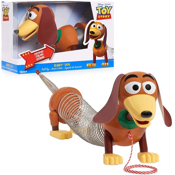 Colorful Slinky Dog pull toy features a brown body with a green collar, a springy metal body, and a friendly face, perfect for kids aged 18 months and up.