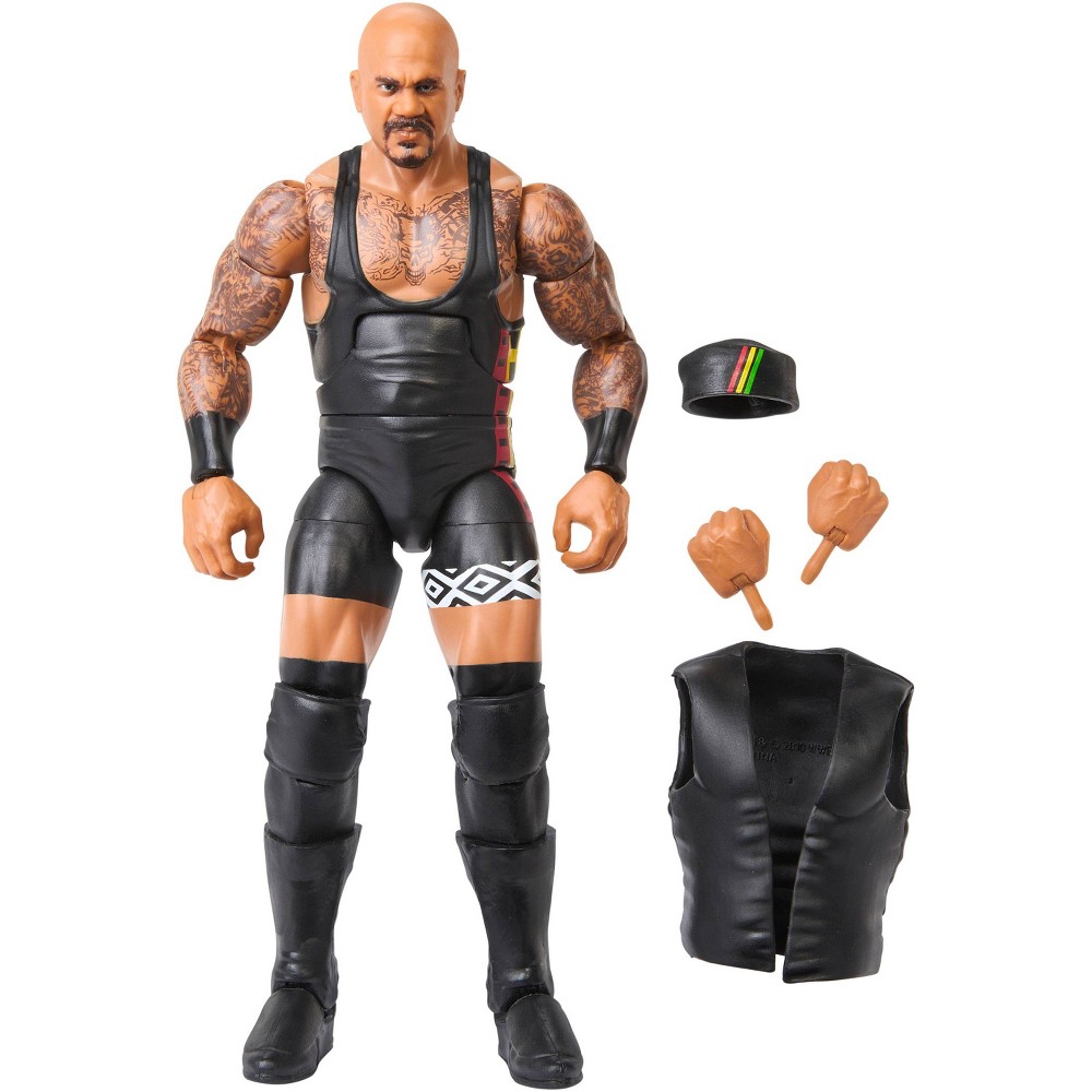 WWE Elite Legends Kama Mustafa action figure features a muscular design with tattoos, wearing a black wrestling outfit, and includes interchangeable hands and a vest.