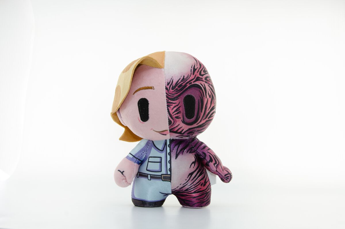 Soft toy featuring Vecna from Stranger Things, with one side showing a friendly character in blue attire and the other side displaying a menacing, detailed monster design in dark colors.