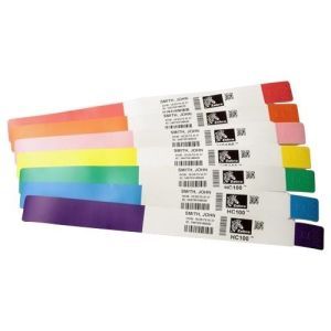 Self-adhesive printer labels in various colors, including pink, orange, yellow, green, blue, and purple, each featuring a barcode and a name label section.