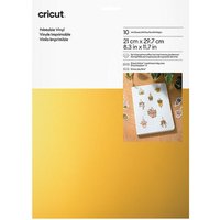 Cricut Joy Xtra Printable Vinyl, gold sheets, 30-pack, with a sample sheet displaying colorful printed stickers.