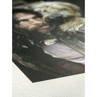 Hahnemühle Agave Art paper with textured surface, featuring a printed image of a man and dog in muted colors.