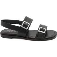 Black leather sandals with dual silver buckle fastenings, flat sole, and ankle strap.