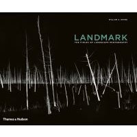 Black hardcover book "Landmark" with white tree silhouettes on the cover.