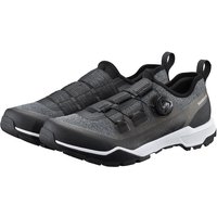 Black and gray Shimano EX7 touring cycling shoes with Velcro straps, BOA dial, and rugged sole.