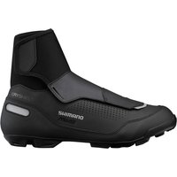 Black Shimano MW5 MTB shoes with DryShield, high ankle cuff, Velcro strap, and rugged sole for cycling.