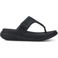 Black wedge-heeled toe-post sandals with cushioned footbed and wide strap by Fit Flop.