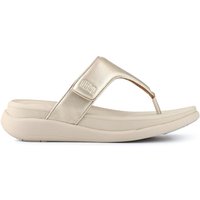 Gold wedge-heeled toe-post sandals with cushioned sole and Fit Flop logo on strap.