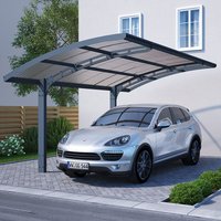 Grey metal carport with arched roof and transparent panels, covering a silver SUV, by Palram Canopia.