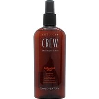 Brown American Crew Grooming Spray bottle, 250ml, with black spray nozzle and white text label.