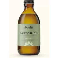 Amber glass bottle of Fushi Organic Castor Oil 250ml with green label and black cap.