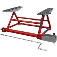 Red Sealey PPL01 car lift with pivot mechanism, black rubber pads, and a detachable crank handle.