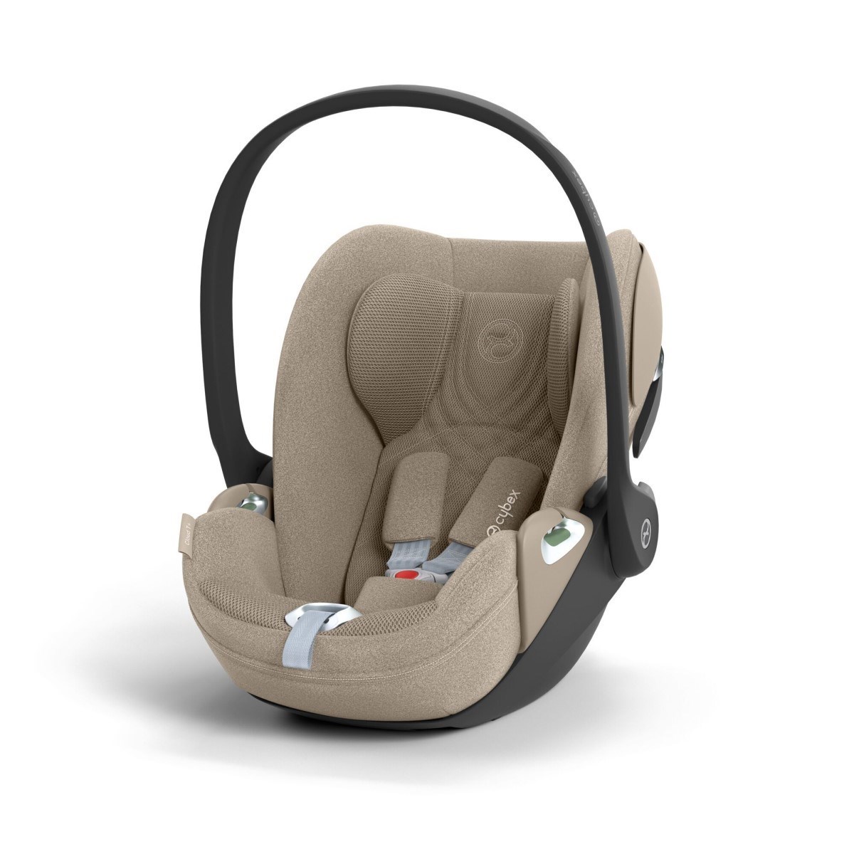 Cybex Cloud T I-Size Plus infant car seat in a soft beige fabric with a black base, featuring a padded harness, ergonomic handle, and safety indicators.