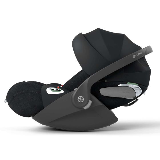 Cybex Cloud T I-Size Plus infant car seat in black with a sleek design, featuring a protective canopy, adjustable headrest, and side impact protection.