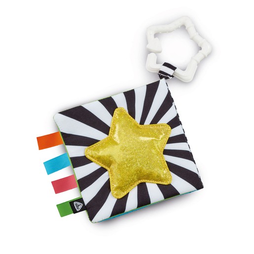 Sensory baby book with a black and white striped cover, featuring a glittery yellow star, colorful ribbon tags, and a white star-shaped teether attachment.