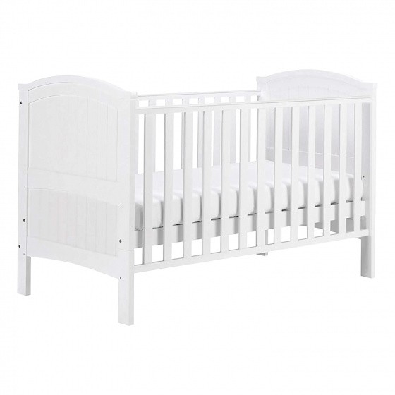 White wooden cotbed with slatted sides and curved headboards, featuring a removable mattress base for adjustable height.