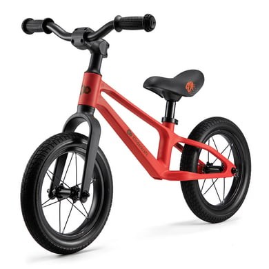Red Kinderkraft Balance Bike ETER with a sleek, lightweight frame, black handlebars, rubber tires, and a comfortable seat, designed for young riders to develop balance skills.