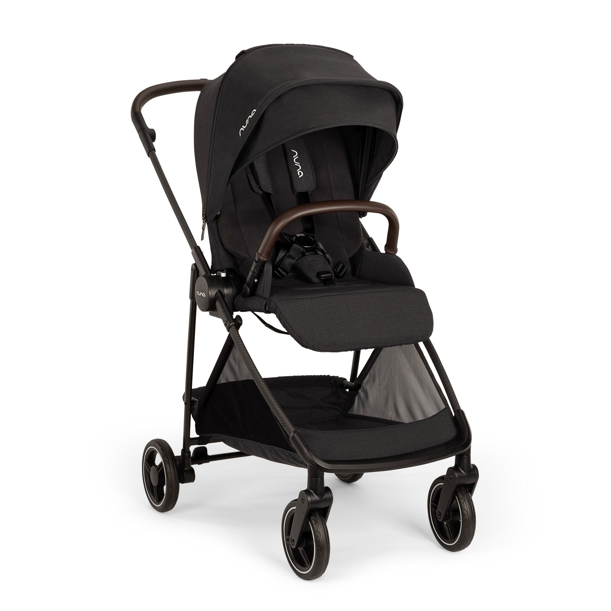 Nuna Ixxa Next Stroller in Caviar, featuring a sleek black fabric seat, adjustable canopy, brown leatherette handle, and a compact foldable design with sturdy wheels.