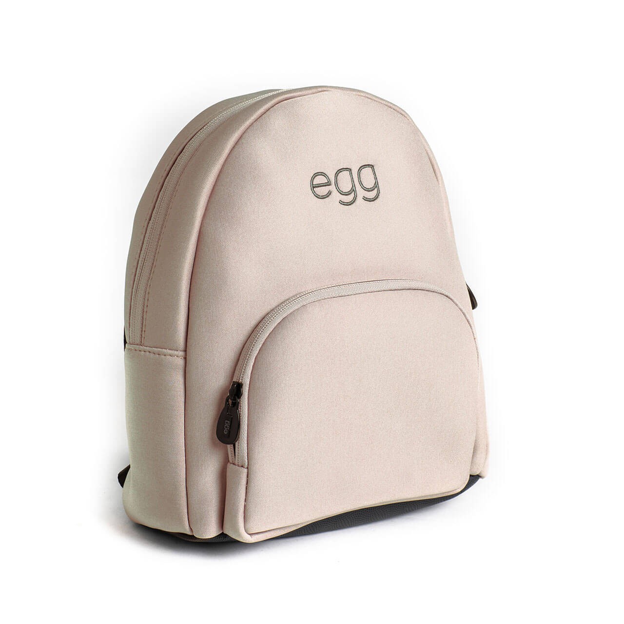 Light pink backpack with a smooth fabric finish, featuring a front zip pocket and the word "egg" embossed on the top.