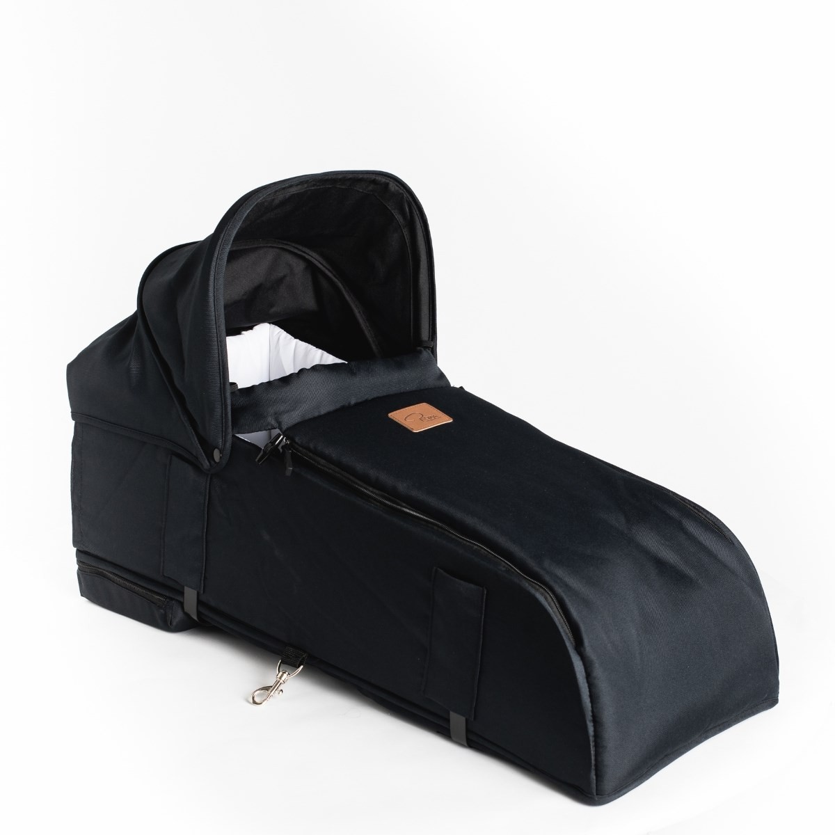 Roma Gemini 2 Carry Cot in Jet Black features a sleek, padded design with a sturdy exterior, a removable hood, and a stylish leather tag for added elegance.