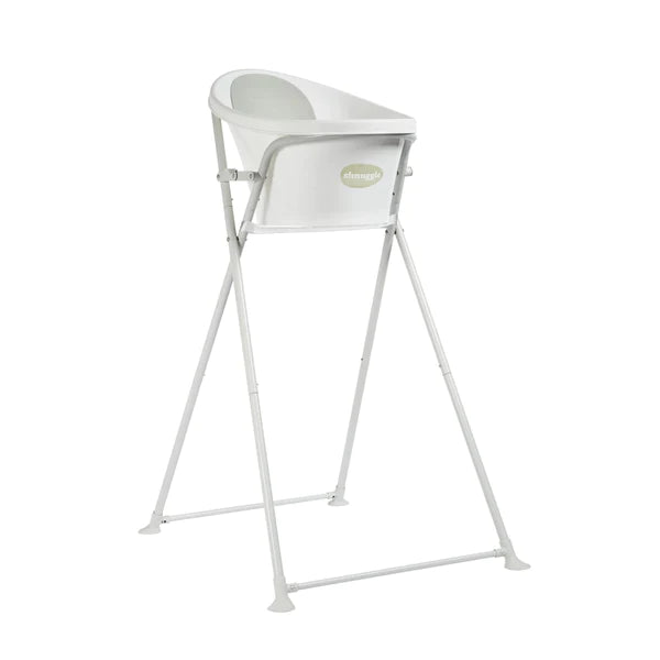 White plastic bath stand with a curved tub design, supported by a sturdy, foldable metal frame in light gray, ideal for baby bathing.
