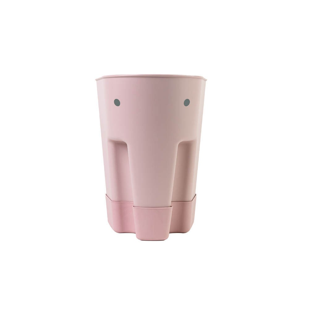 Blush pink elephant-shaped bath toy scoop and drying caddy with a smooth plastic finish and two small gray eyes, designed for easy storage and drainage of bath toys.