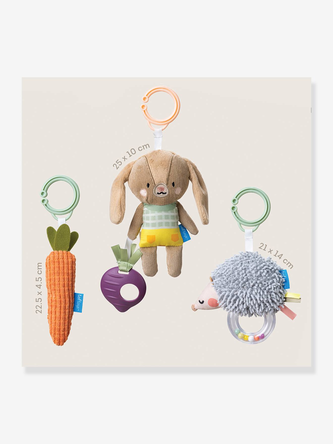 Three plush sensory toys for babies: a soft brown bunny, a textured carrot, and a cuddly hedgehog, all with attachment rings for easy travel and play.