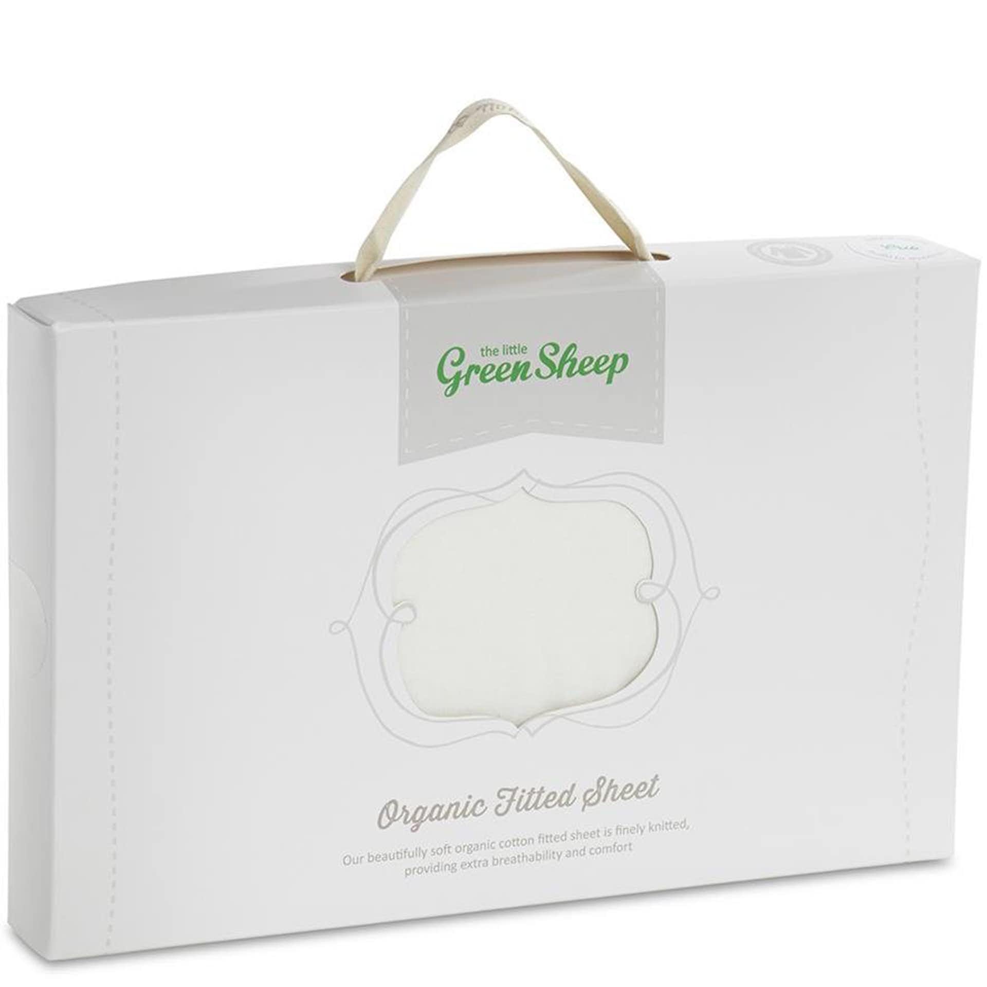 White packaging featuring a handle, labeled "Organic Fitted Sheet" by The Little Green Sheep, showcasing a soft, organic cotton jersey material for Moses baskets.