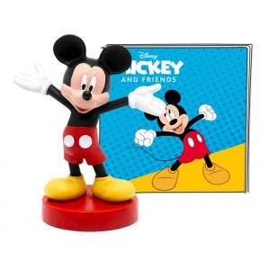 Mickey Mouse figurine in red shorts and yellow shoes stands on a red base, next to a colorful storybook featuring Mickey and friends on a blue background.