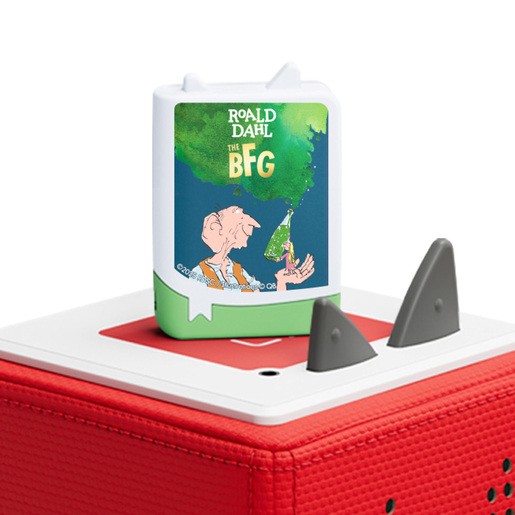 White Tonie figure featuring colorful artwork of Roald Dahl's "The BFG," with a green cloud and a character illustration, placed on a red Toniebox with gray ears.