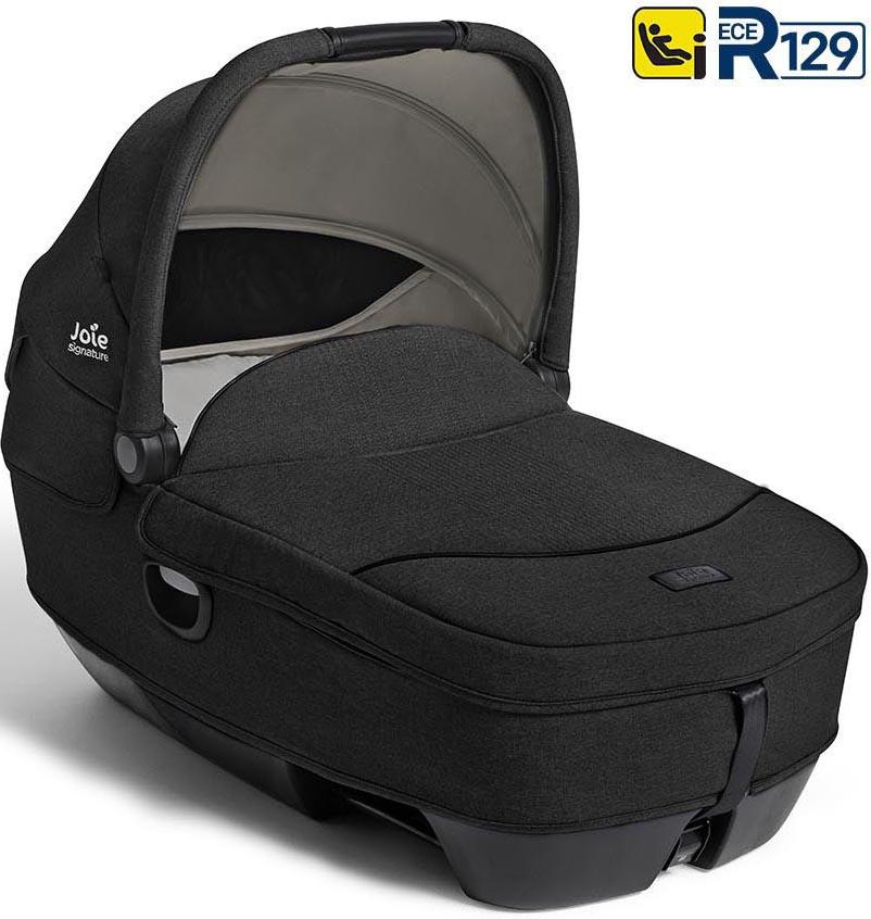 Black Joie Calmi R129 Signature carrycot with canopy, sleek design, and padded interior in Eclipse color.