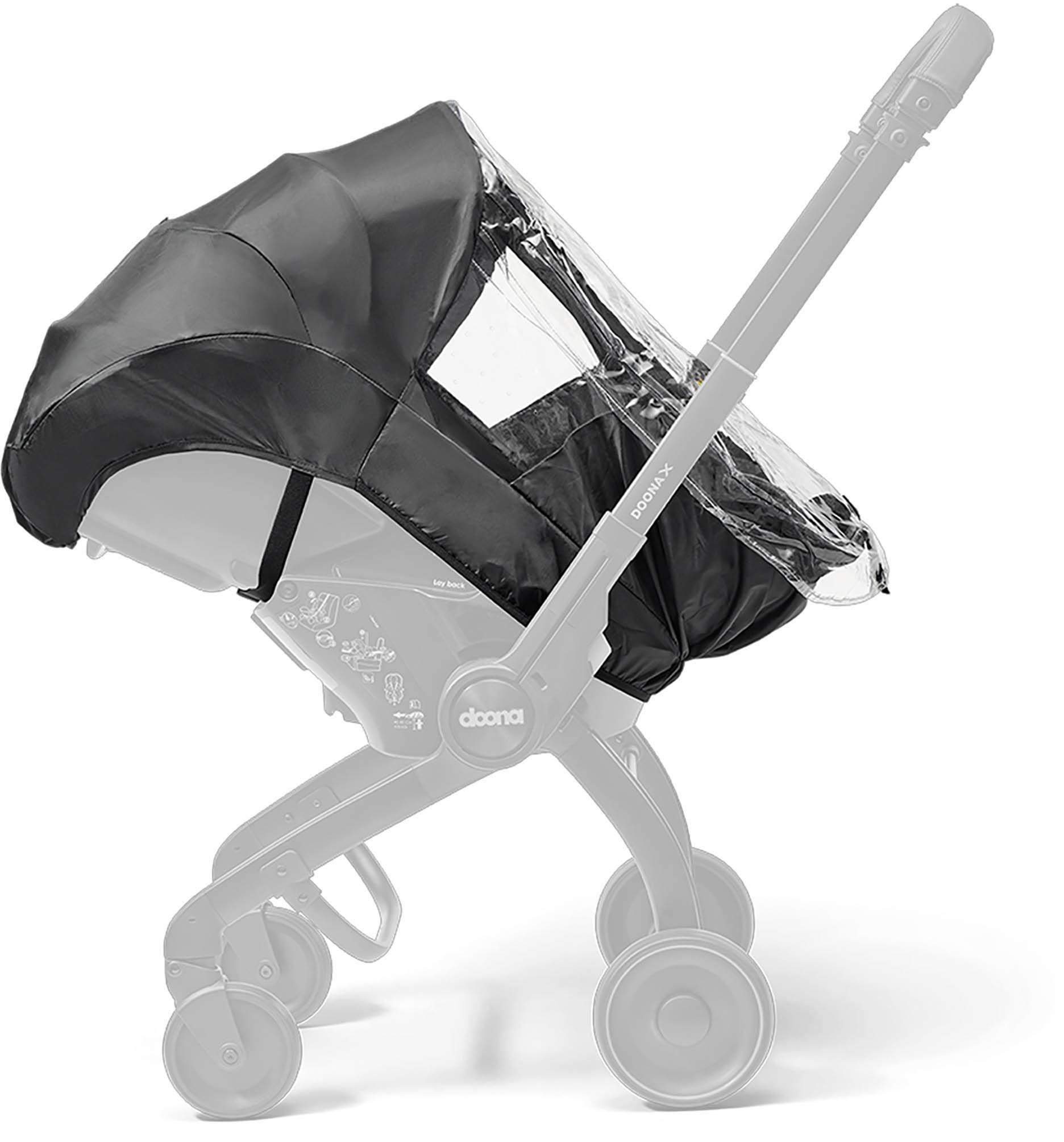 Black and transparent Doona X Rain Cover on a stroller, featuring a clear window and tailored fit.
