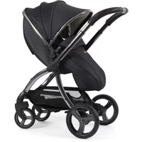 Black Egg 3 stroller with sleek frame, adjustable canopy, padded seat, and four large wheels in carbonite finish.