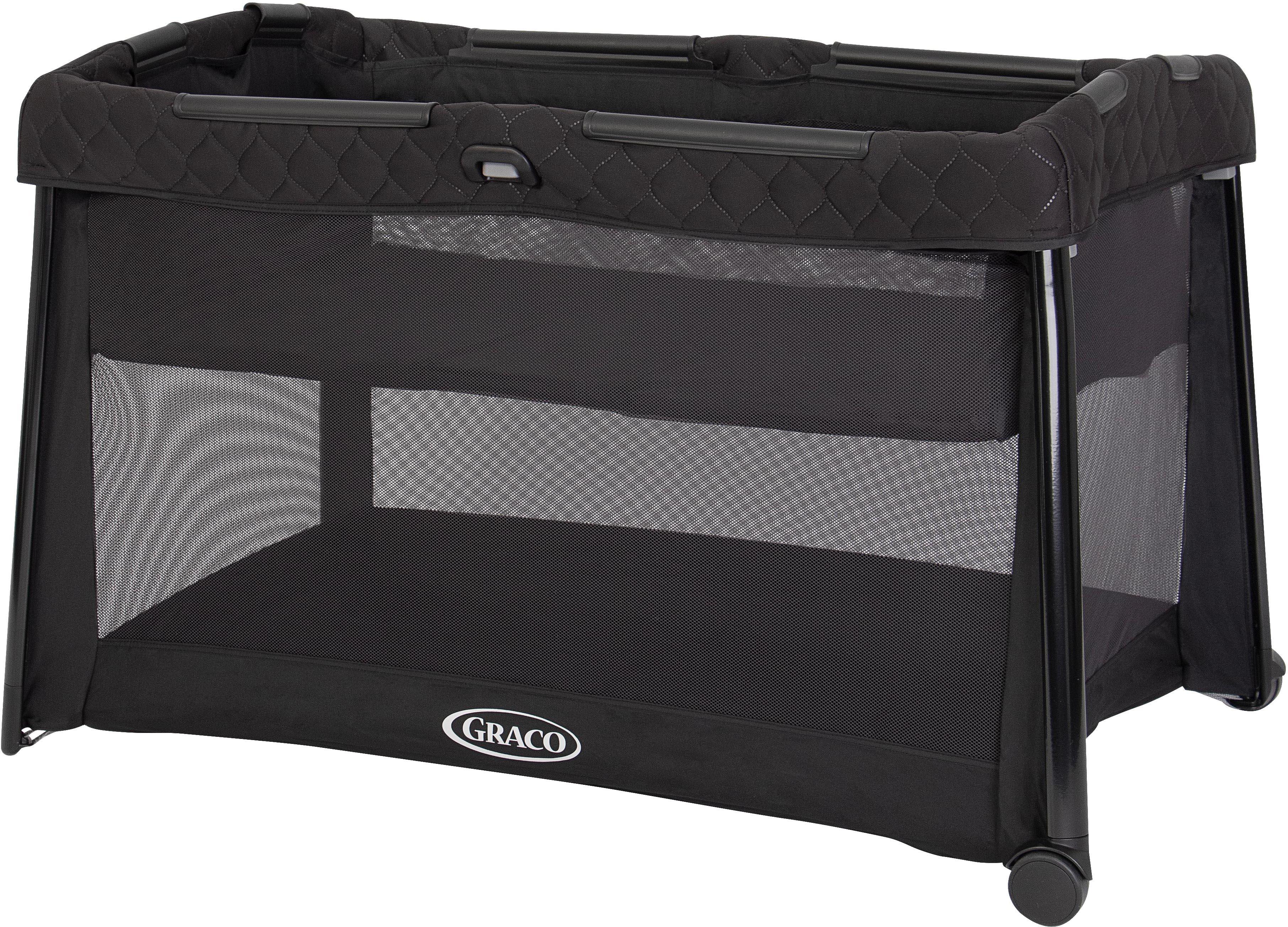 "Black Graco FoldLite LX Travel Cot with Bassinet, quilted edges, mesh sides, and compact foldable design"