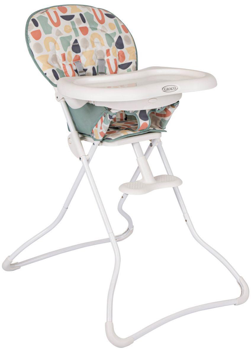 Graco Snack N' Stow Highchair with colorful geometric pattern, white tray, and foldable white metal frame.