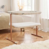 Tutti Bambini ZiZee rocking crib in walnut and beige, mesh sides, wooden legs, and curved base for gentle rocking.