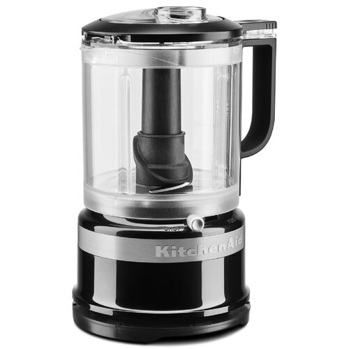 Compact 1.2L mini food chopper in Onyx Black with a transparent bowl, black handle, and stainless steel accents, featuring a single control button for easy operation.