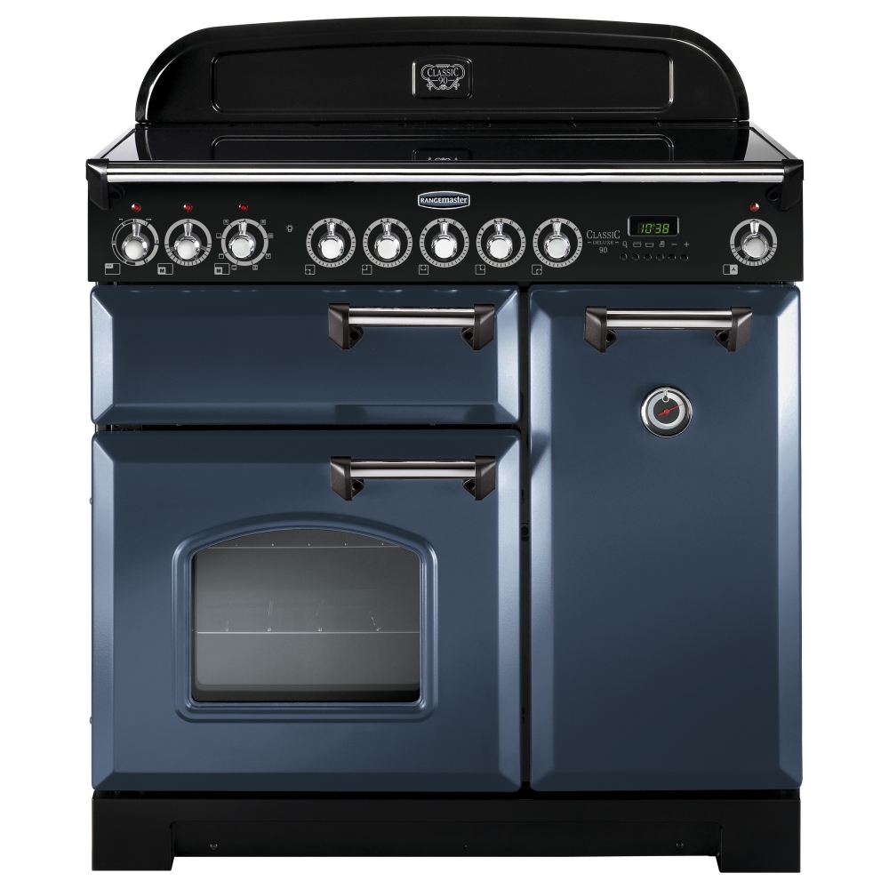 Classic Deluxe 90cm induction range cooker in stone blue with chrome trim, featuring a black control panel, six knobs, and two ovens with a glass window.