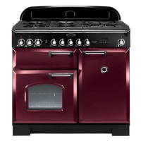 Rangemaster 95940 CLASSIC Deluxe 100cm induction range cooker in cranberry with chrome trim, featuring six burners, two ovens, and a sleek black control panel.