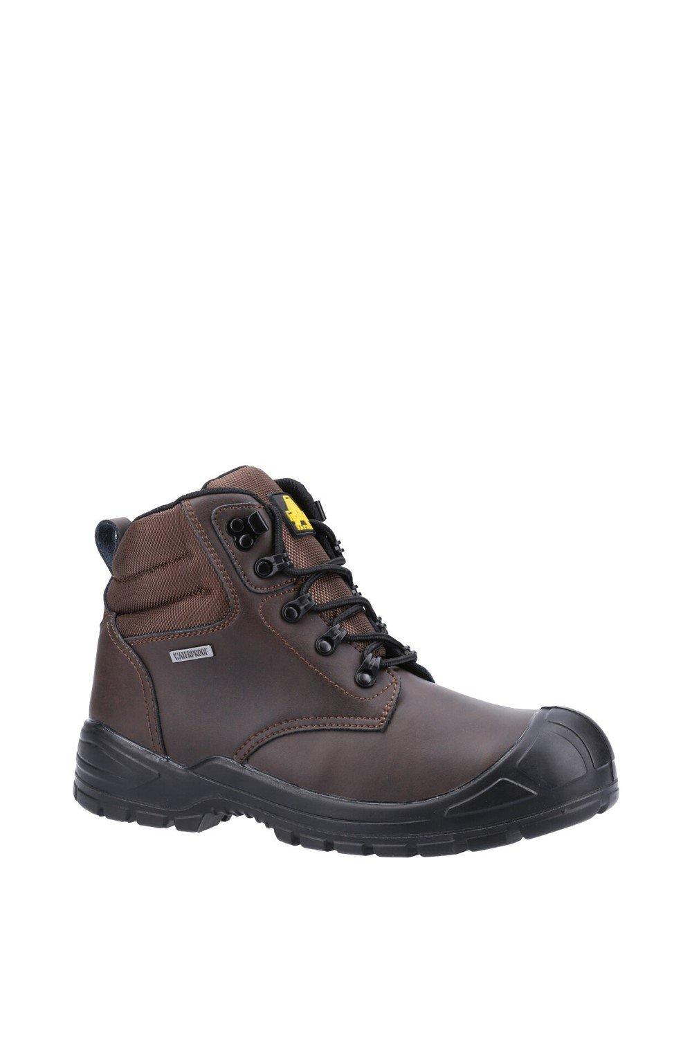 Brown unisex safety boot featuring a durable leather upper, padded collar, lace-up front, and reinforced toe cap, designed for comfort and protection.