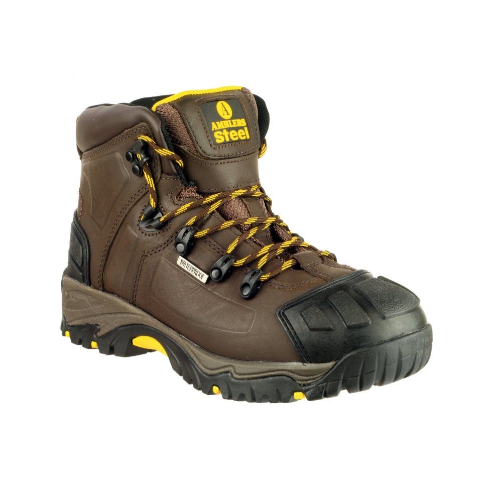 Brown waterproof safety boots with steel toe, yellow laces, and a rugged black rubber sole, featuring reinforced toe cap and padded collar for comfort.