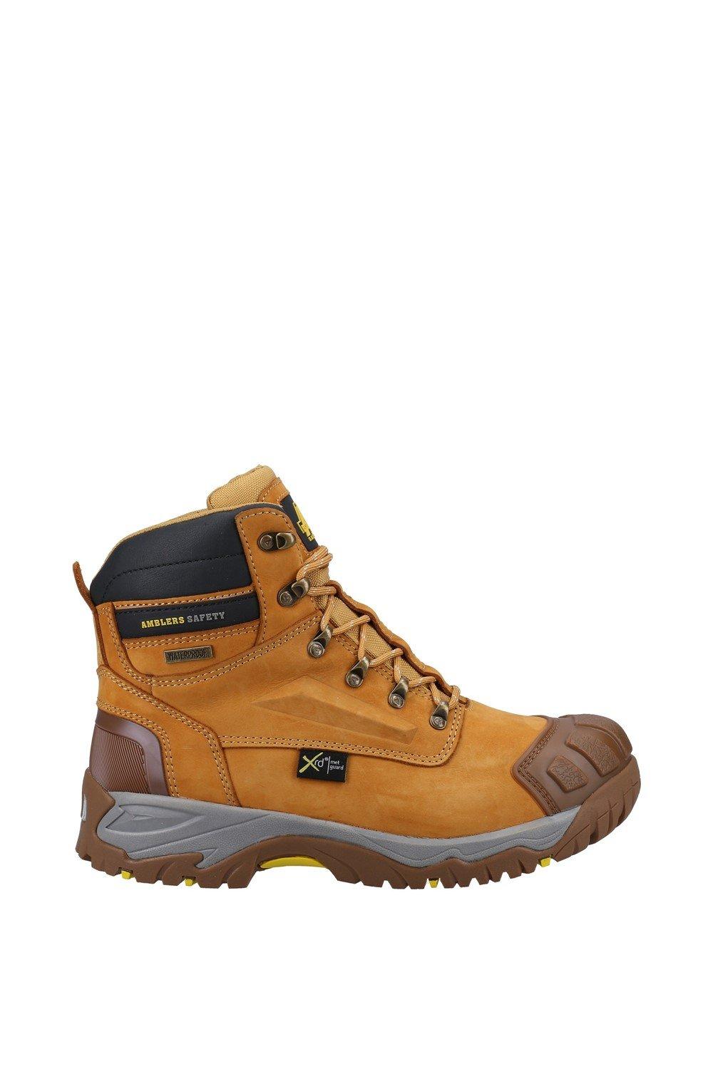 Honey-colored leather safety boots with a padded collar, metal eyelets, and a rugged rubber sole, featuring Amblers Safety branding on the side.